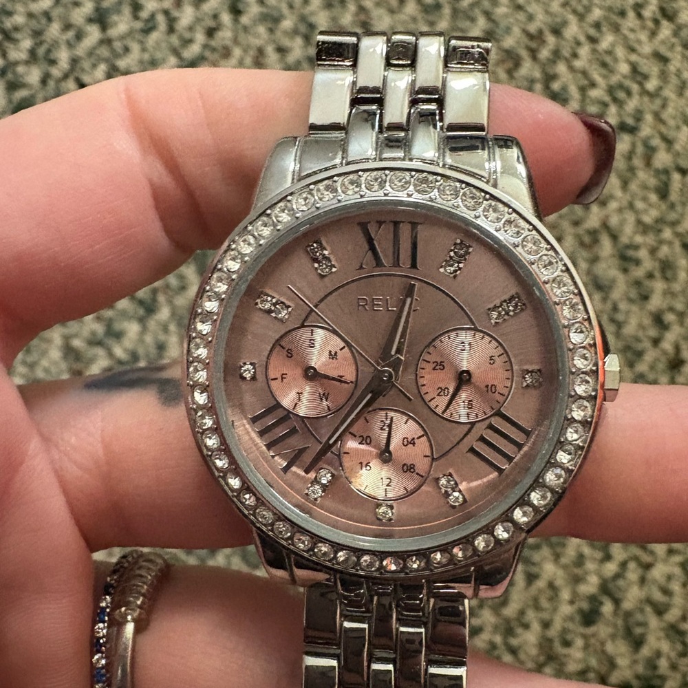 Silver Relic watch with pink face